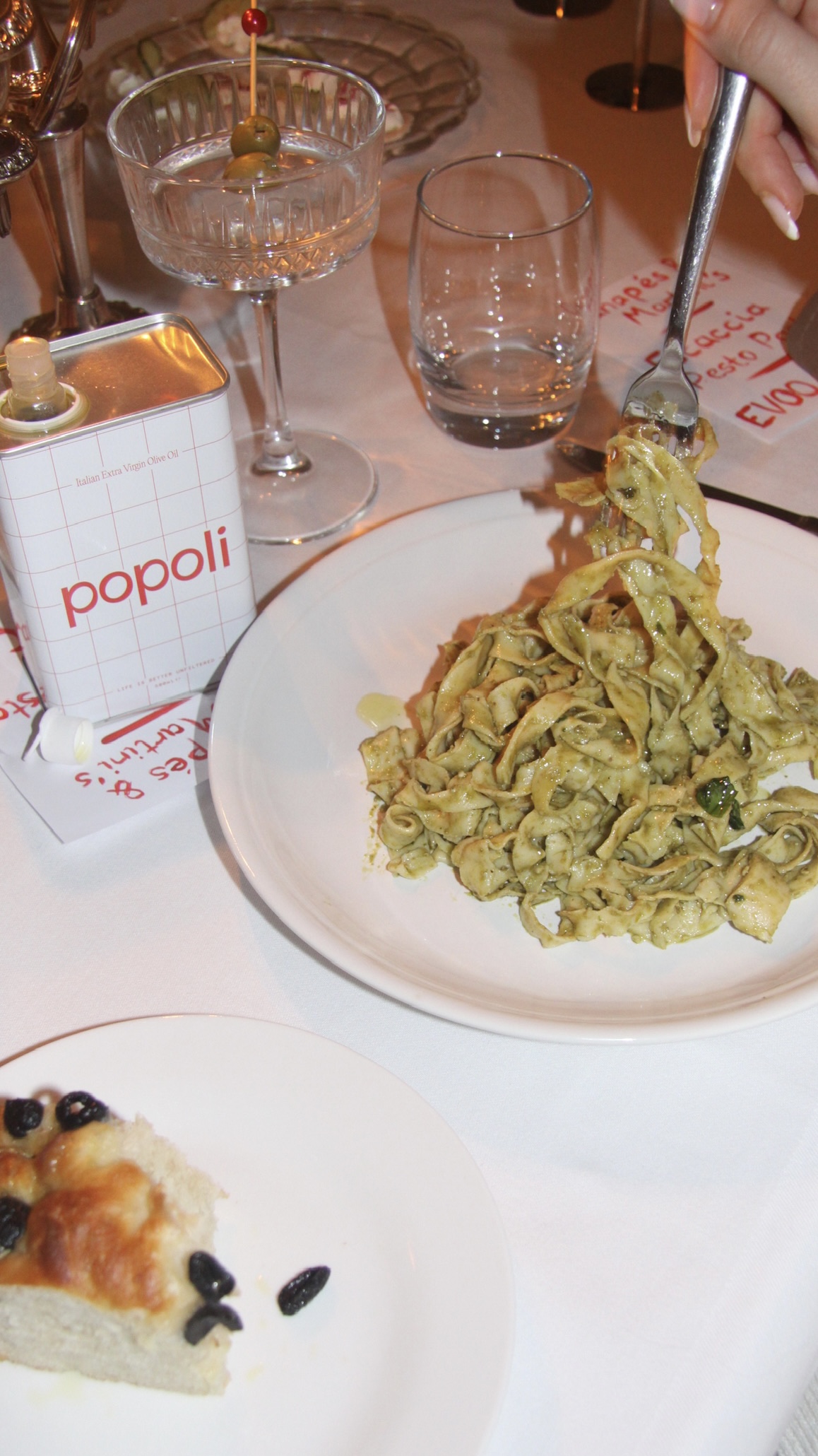 Brand shoot for Popoli olive oil, demonstrating use with plate of pasta